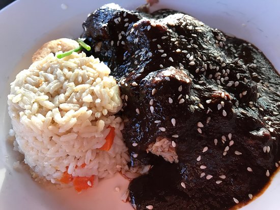 El Agave Restaurant & Tequileria signature dishes Mole Poblano Don JulioTacos De CamarónEl Agave Chile Relleno